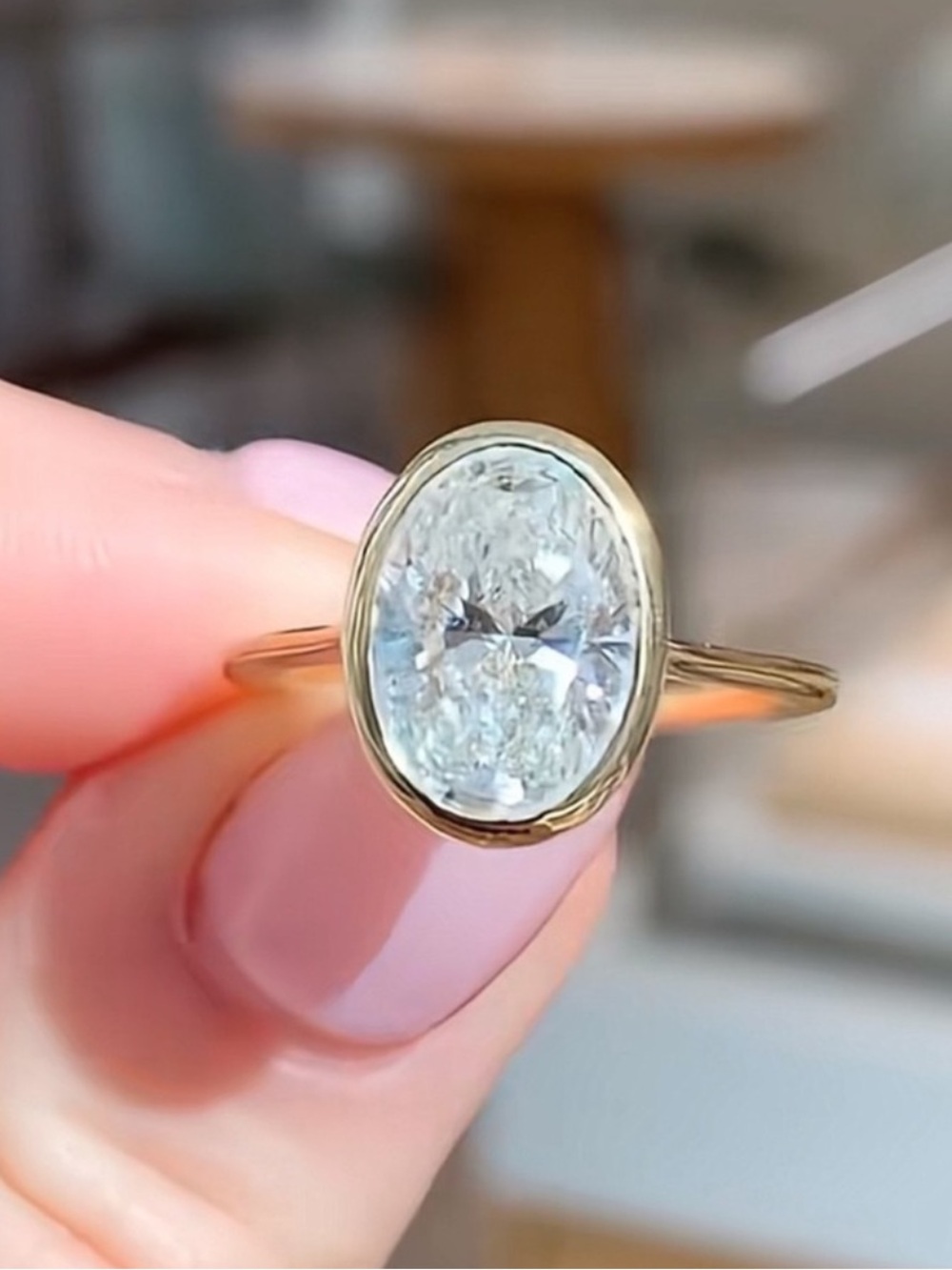 Gold Oval Solitaire Ring with Clear Oval Stone